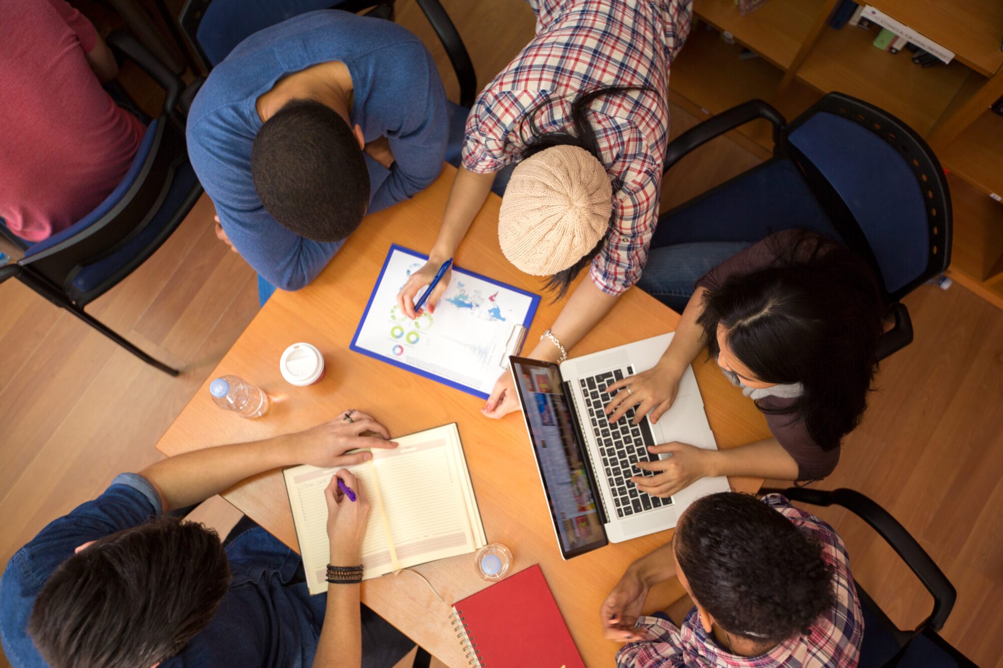 Top view of group of colleagues working