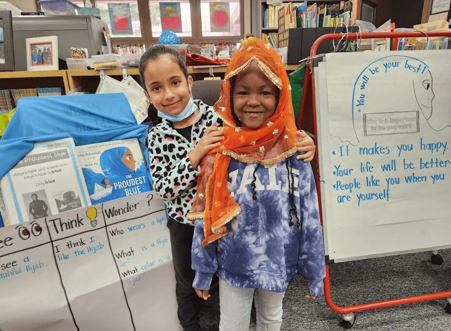 In Darla’s classroom, reading The Proudest Blue inspired one student to bring in her Indian chunni to discuss how this head covering is different from the hijab that students had been learning about.