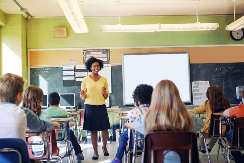 Teacher with students